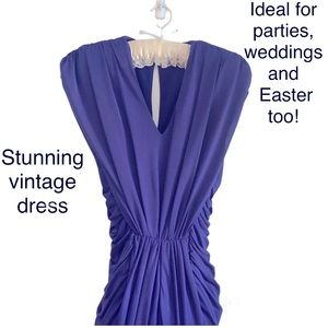 Fabulous vintage dress. Silky and flattering.Feels like a million on!Fits size 9